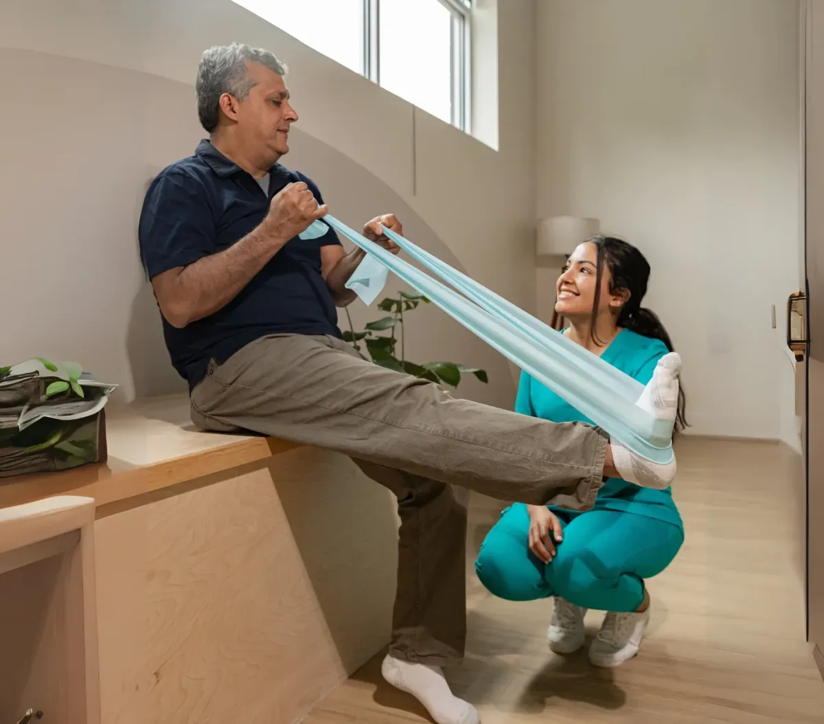 Senior exercising with professional support